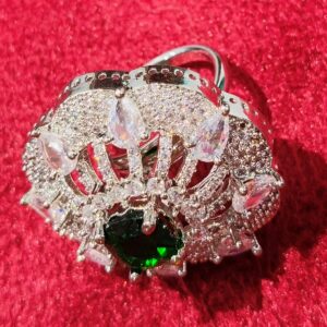 Elegant Fusion: Diamond Ring Showcasing Green Center Gem