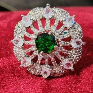 Elegant Fusion: Diamond Ring Showcasing Green Center Gem